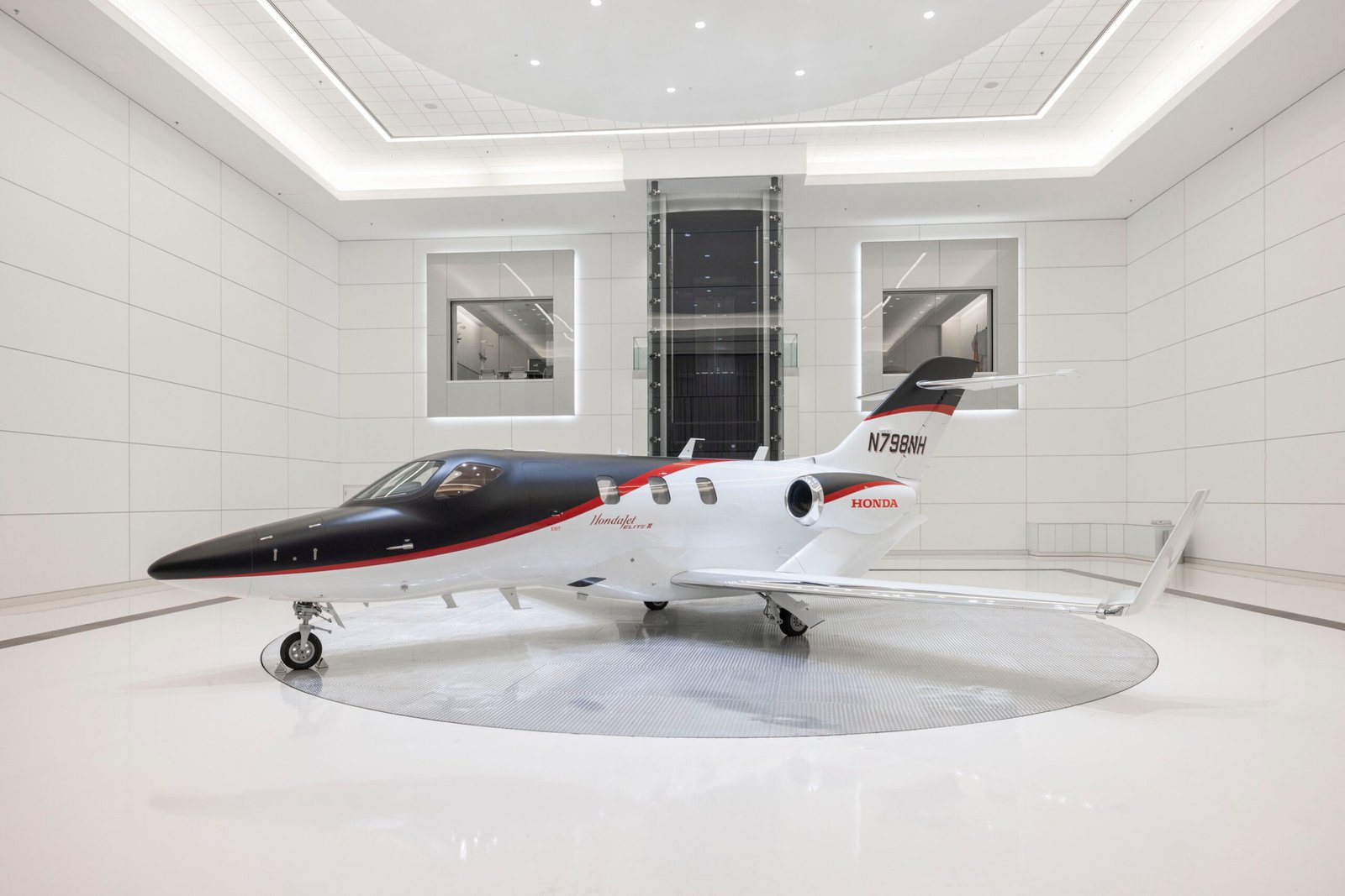 2025 HondaJet Elite II displayed in a bright aircraft showroom