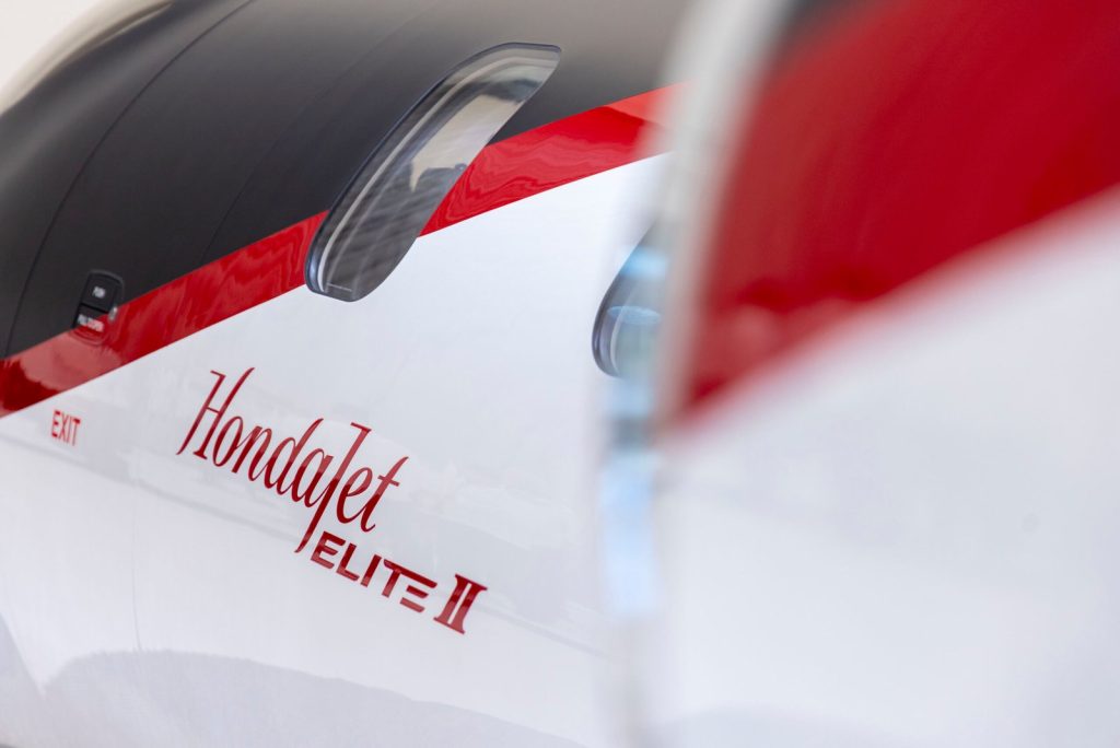 HondaJet Elite II cabin windows and red, black, and white livery detail